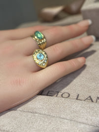 1 Cts Paraiba Eye Ring with Diamonds 18 Ct Gold  (Available at Madlords, Paris)