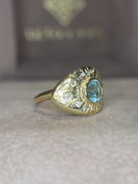 1 Cts Paraiba Eye Ring with Diamonds 18 Ct Gold  (Available at Madlords, Paris)