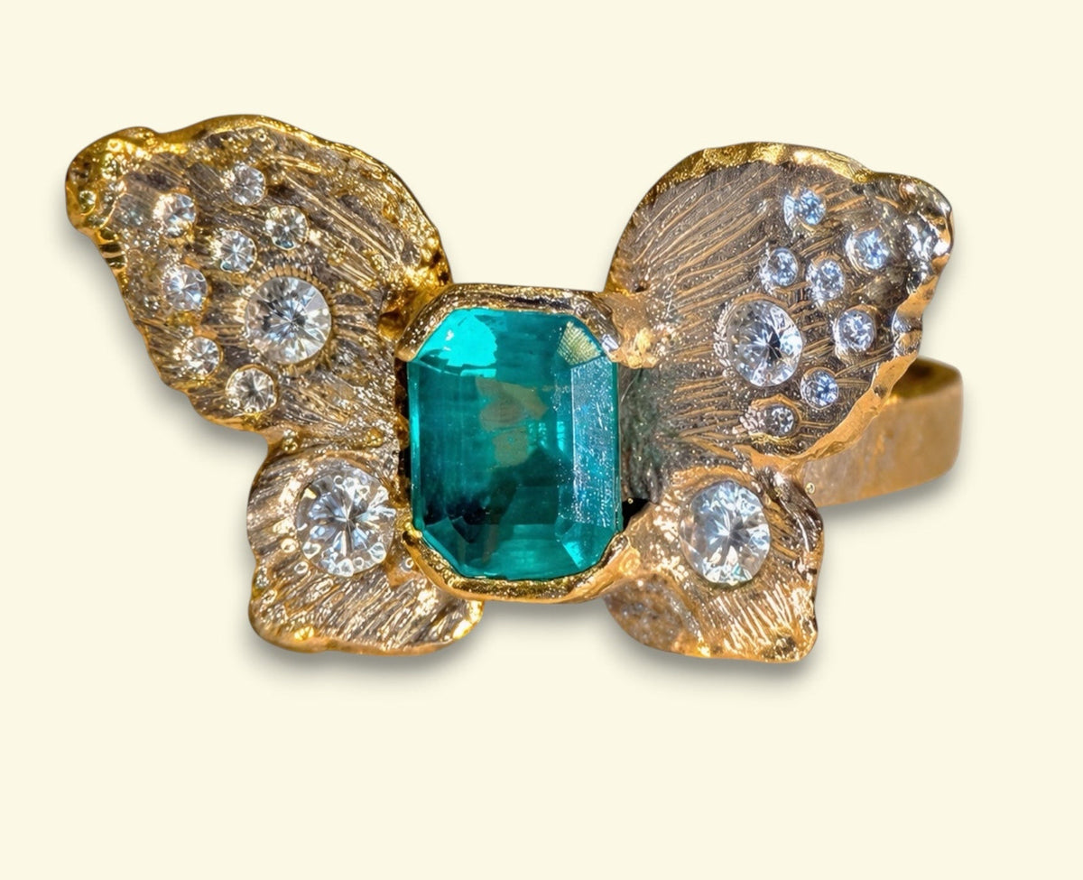 IGI Certified 1.3 Ct Emerald Queen Butterfly Ring with Diamonds in 18 Ct Gold Half Bezel