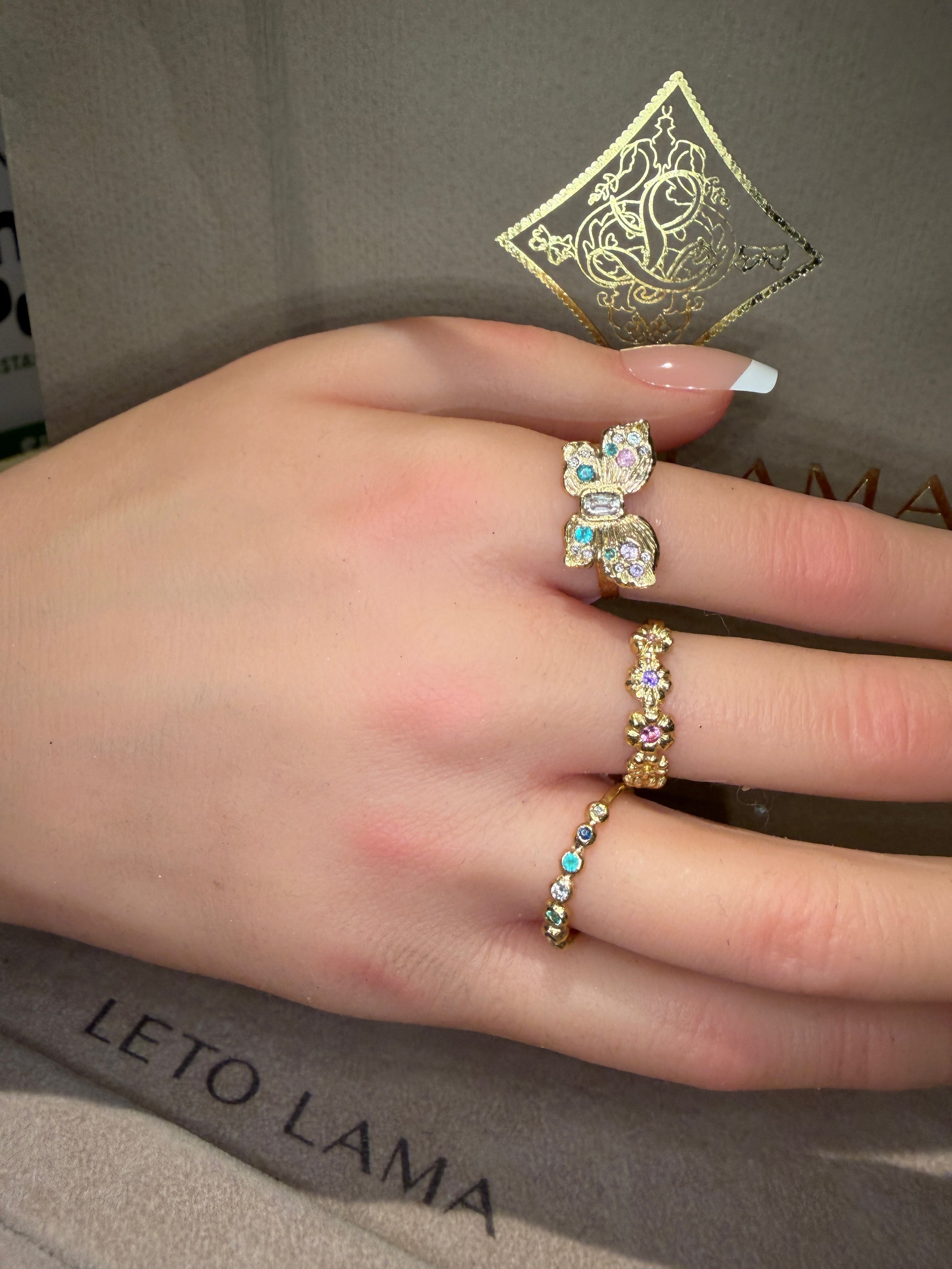 Microsculpted Flower Band Sapphires and Paraiba Tourmaline in 18 Ct Gold Ring (Available At Tomfoolery London)
