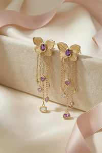 Butterfly Cuckoo Charm Earrings in 18 Ct Gold, Purple Oval Sapphires (Available at Tomfoolery London)